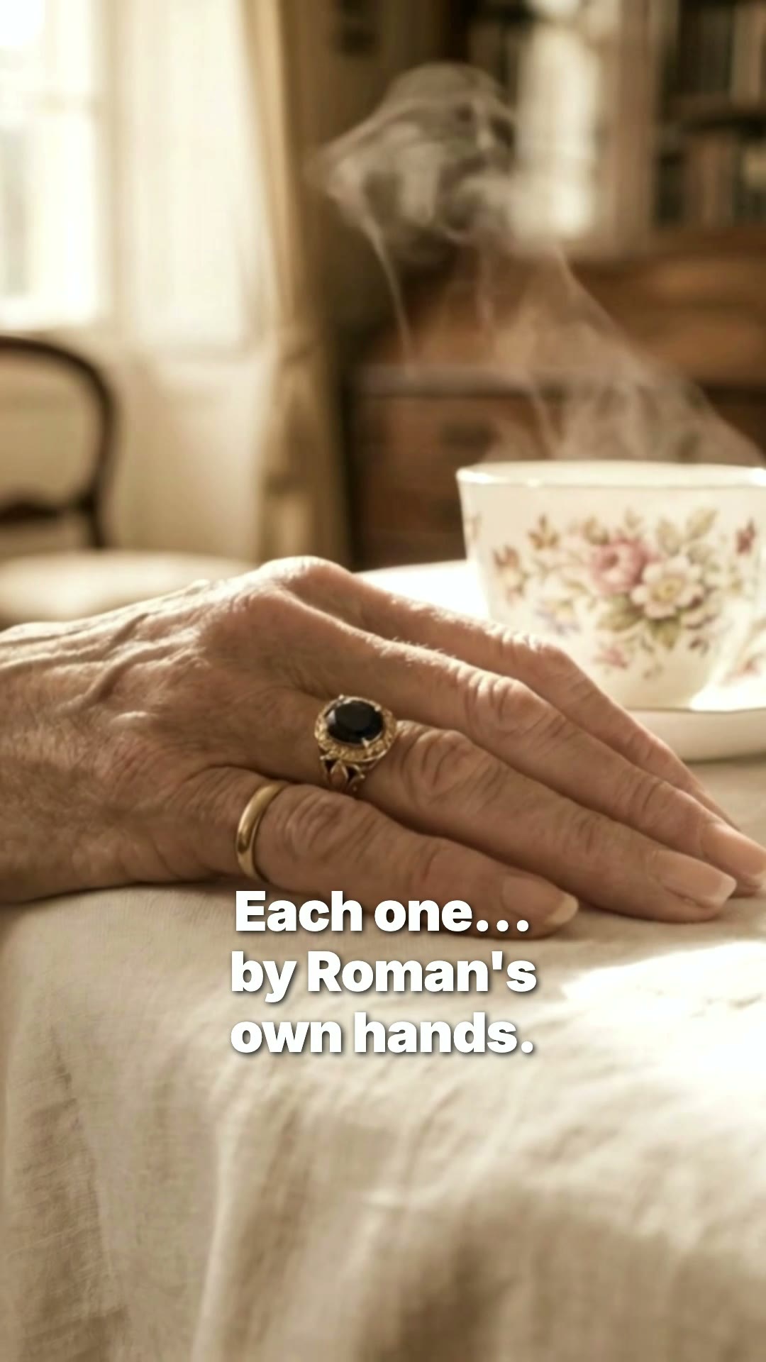 Sapphire ring on hand with morning tea